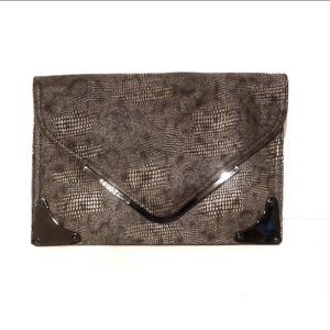 BCBGMaxaria Reptile envelope clutch